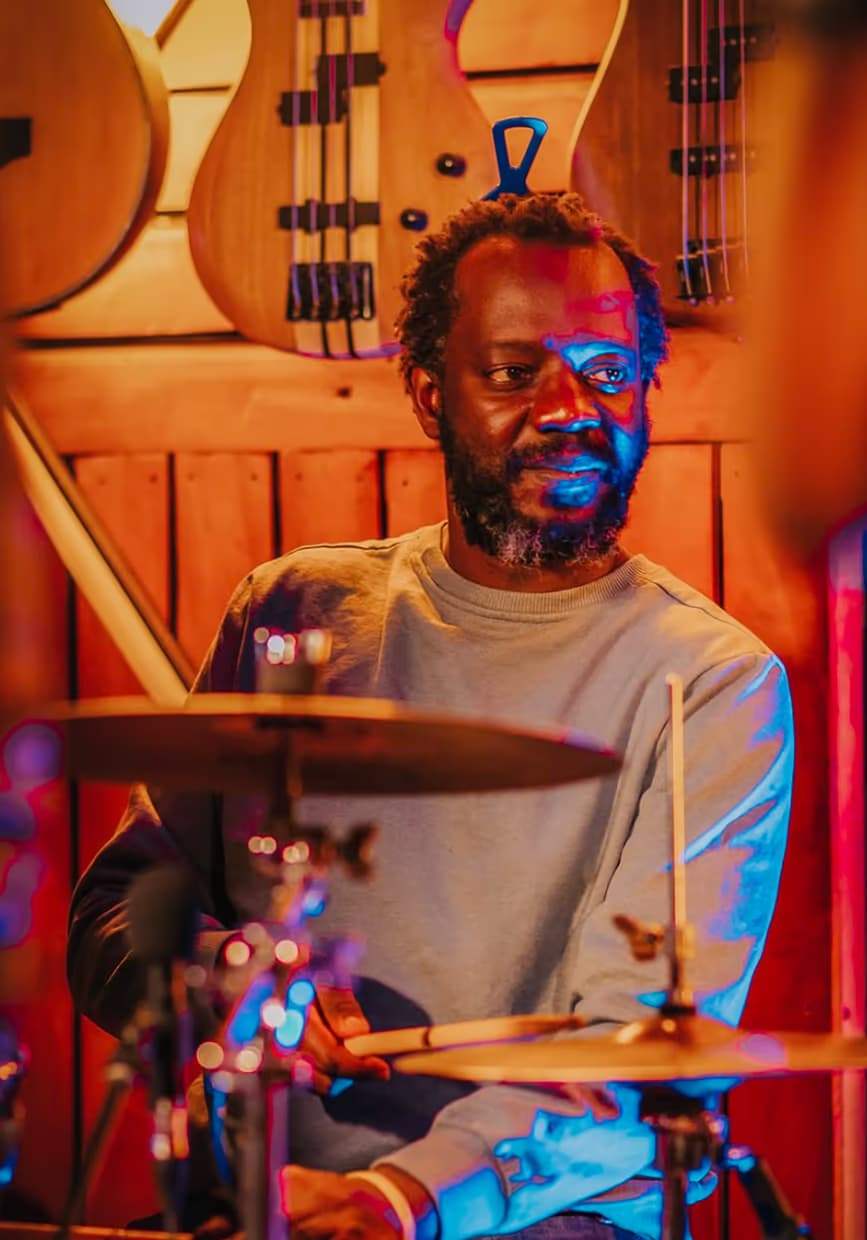 A drummer performing at Geco Cafe